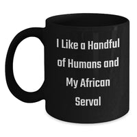Load image into Gallery viewer, African Serval Cat Lover Gifts from Friends Christmas Unique Mugs, I Like A Handful Of Humans And My African Serval Funny Quote Mug, Black Coffee Mug, 11oz or 15oz Ceramic - Main
