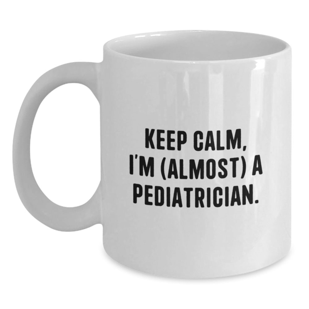 Funny Pediatrician Gifts - Keep Calm, I'm (almost) A Pediatrician. White Coffee Mug for Birthday from Friends to Family - Main