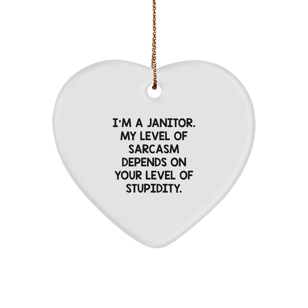 Funny Janitor Gifts from Friends, Coworkers, or Family - 'I'm A Janitor, My Level Of Sarcasm Depends On Your Level Of Stupidity.' Heart Ornament for Christmas - Image 1