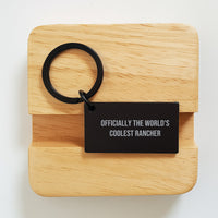 Load image into Gallery viewer, Rancher Gifts from Friends - Officially The World&#39;s Coolest Rancher Keychain, Birthday Unique Rancher Keychain, Keychain for Rancher, Funny Rancher Gift - Image 2
